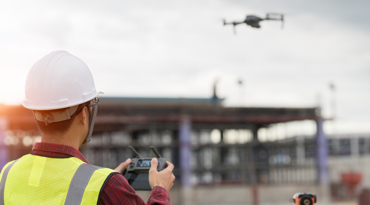 Engineer conducting inspection with drone.