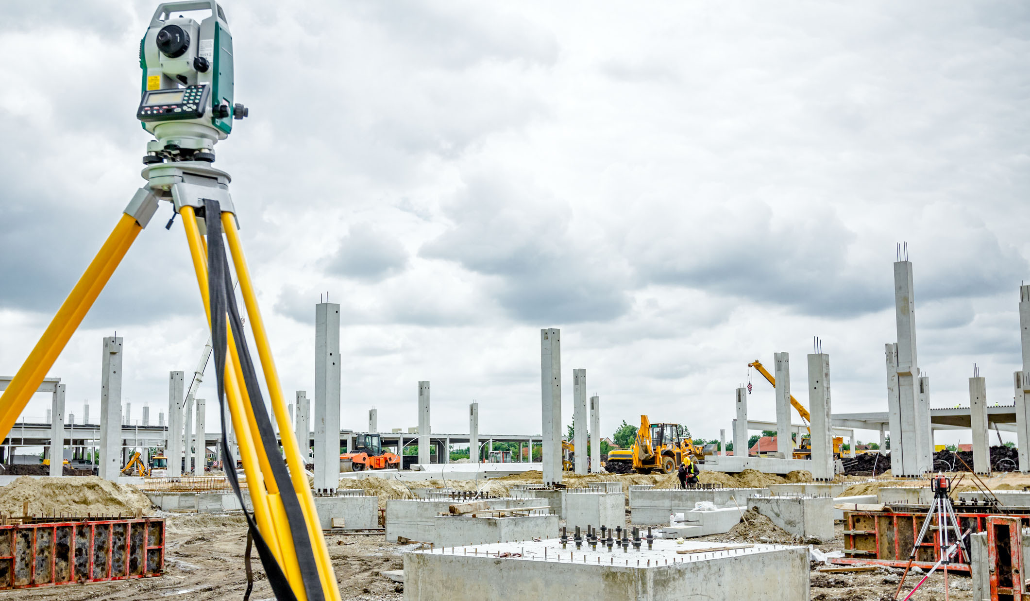 Surveyor instrument is for measuring level on construction site. Surveyors ensure precise measurements before undertaking large construction projects.